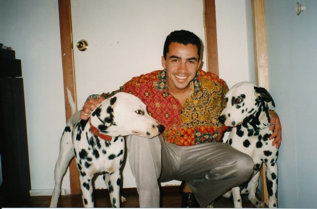 Alex da Silva in San Francisco house, 1993 with his two dogs..