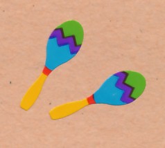 Maracas - stickers - we used the to prove admission paid in studio classes!